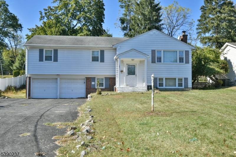 Great Opportunity ! This large 4 bedroom home, with a first floor bedroom is not to be missed !