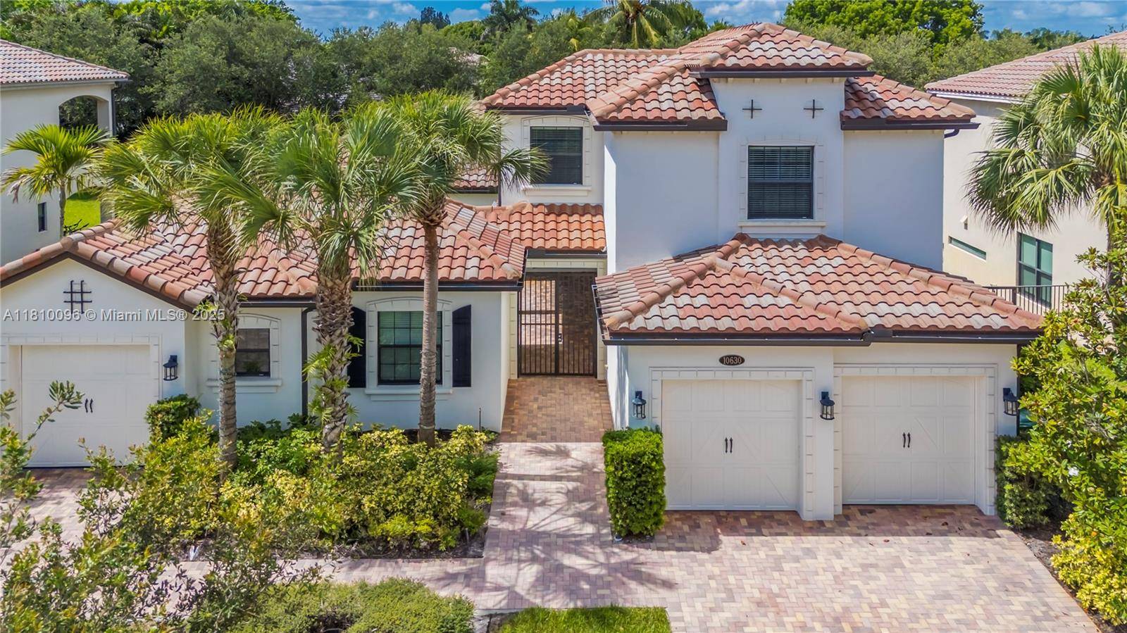 Located in Mill Creek 2015 build, a private boutique gated community of just 20 homes in Cooper City, this unique two story residence offers 5 bedrooms, 4.