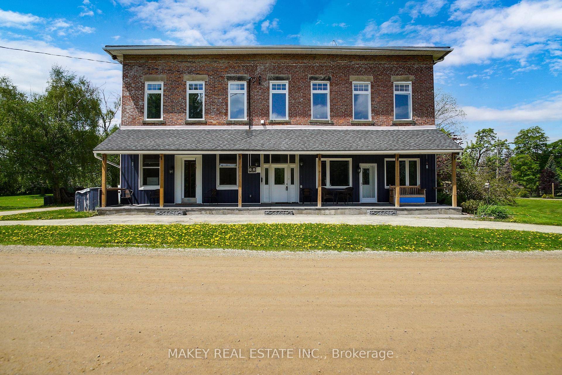 Discover this stunning duplex nestled on a generous 0.