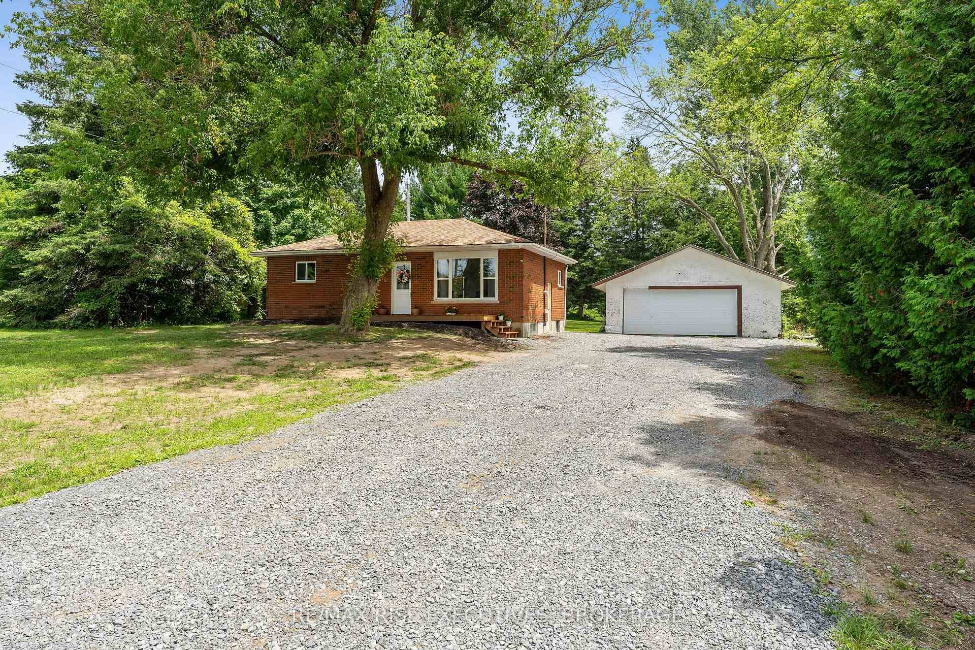5212 Wilmer Road Fully Renovated Brick Bungalow on a Private Acre This beautifully updated 2 bedroom all brick bungalow sits on just over an acre, offering privacy, charm, and modern ...