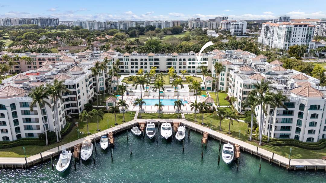 Welcome to luxury waterfront living in downtown Boca Raton at the coveted Mizner Court, located on the exclusive grounds of The Boca Raton.