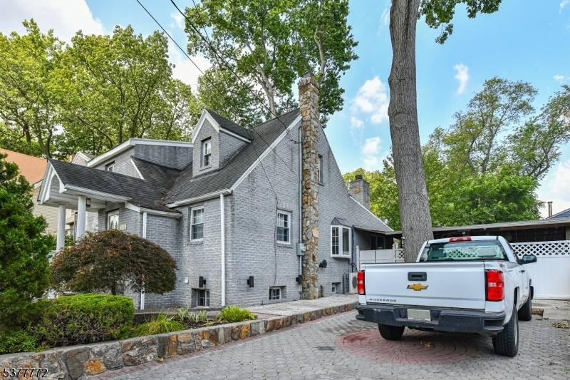 Spacious and well maintained home in the heart of Dumont offering 5 bedrooms and 4 full bathrooms.