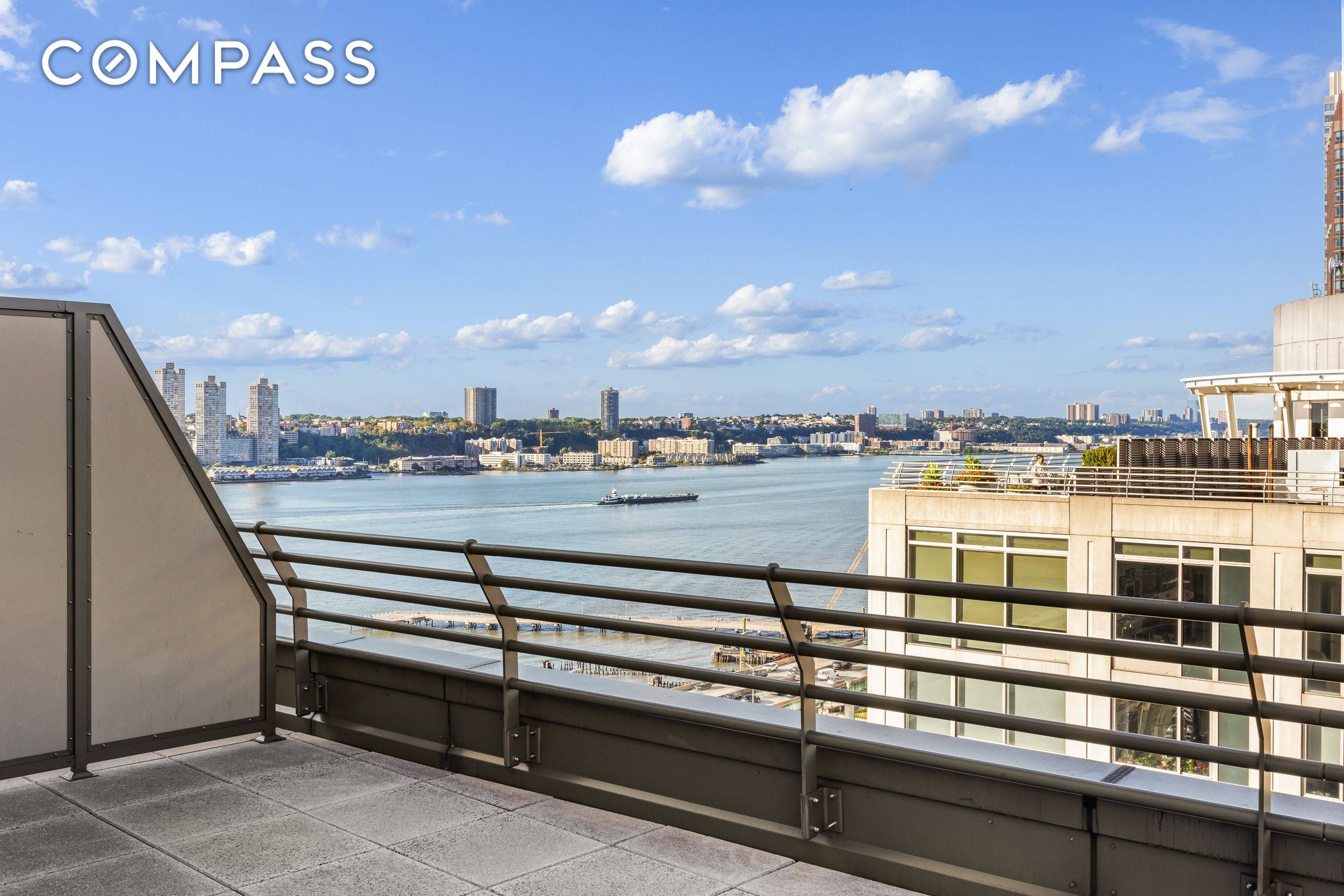 Indoor outdoor living with sweeping Hudson River and skyline views.