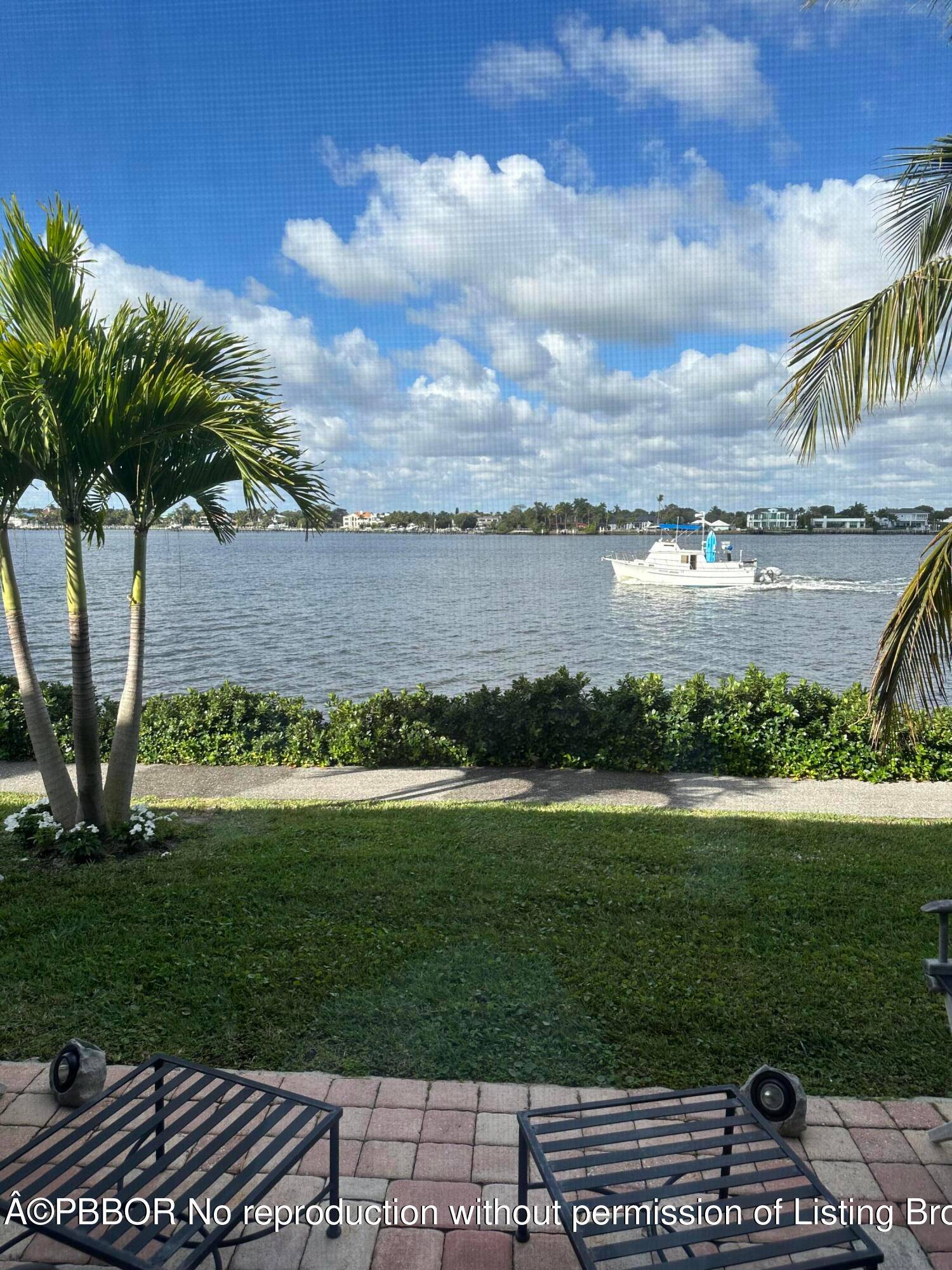 Enjoy extraordinary sunsets from this west facing Direct Intracoastal turnkey !