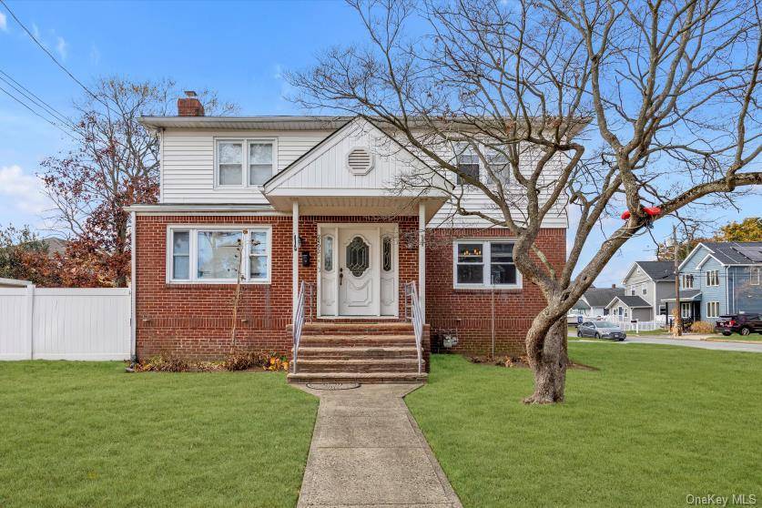 5 Bedroom, 3 Bath Updated Colonial with Finished Basement that Includes Hardwood Floors, gas heat.