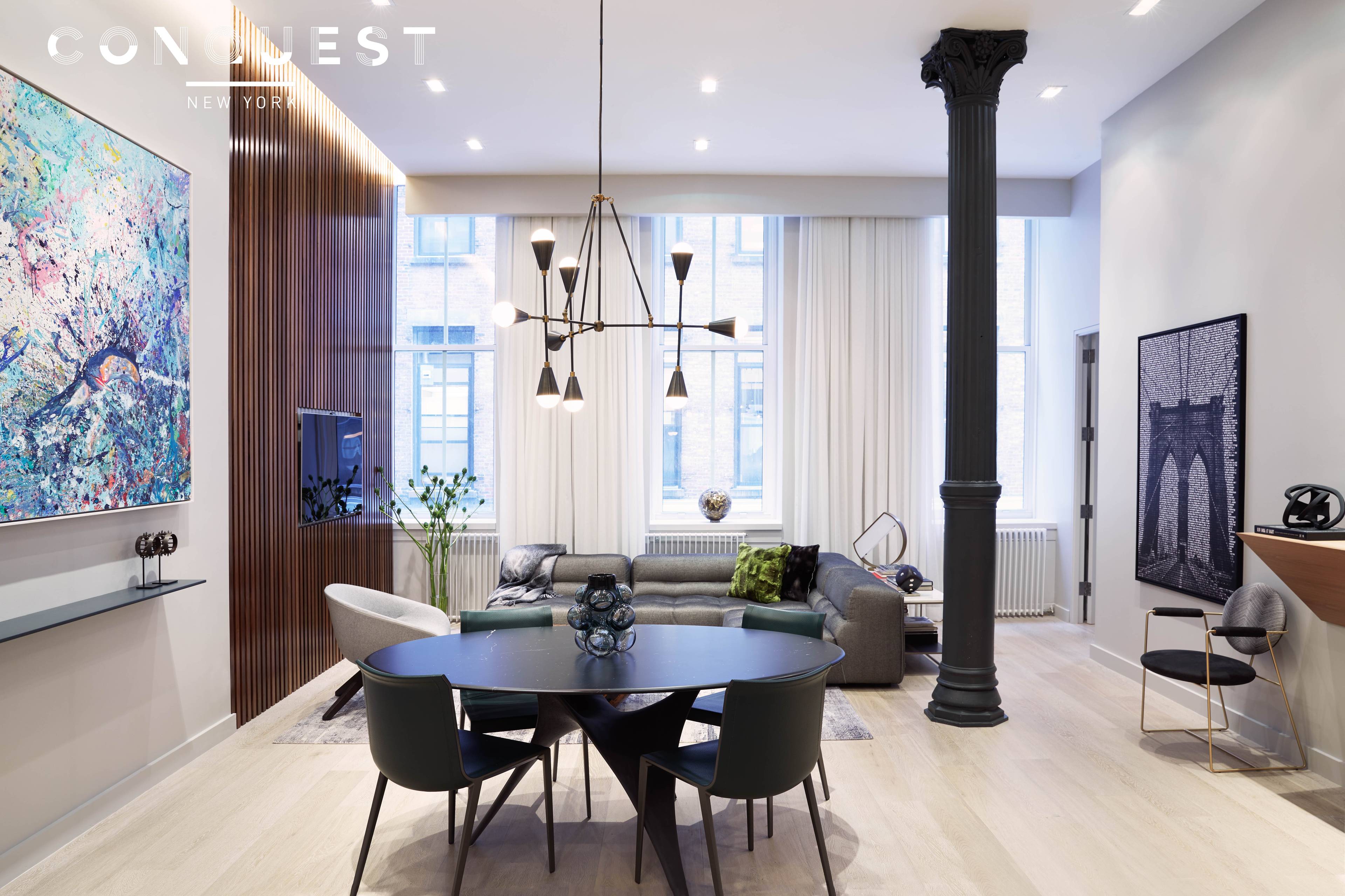 Experience Unit 2E, a sophisticated 1, 446 square foot condominium loft featuring one bedroom plus an office or second bedroom, and two bathrooms, with soaring 14 foot ceilings in the ...