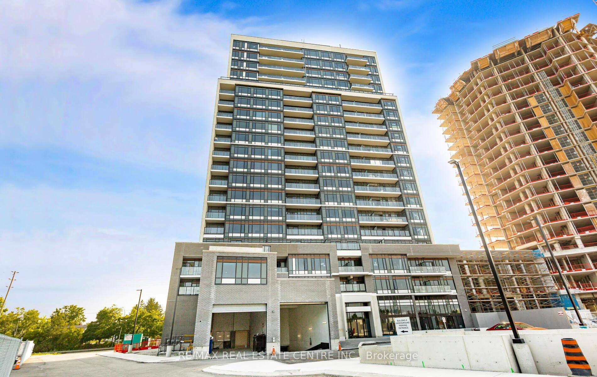 Modern 1 year old 1 Bed Den condo Apartment with balcony in the heart of Milton !