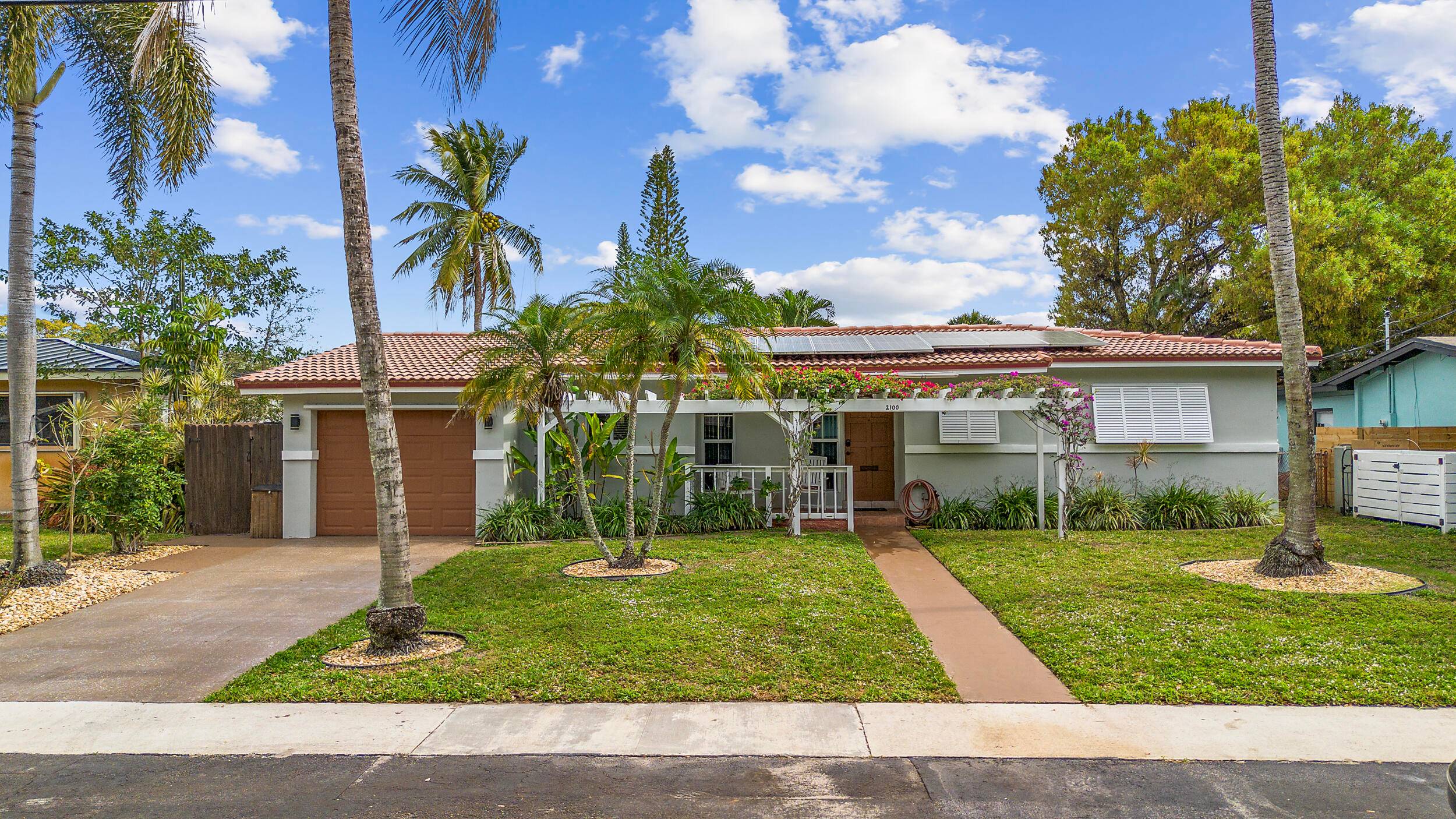 Exquisite Waterfront Retreat in Flamingo Park No HOA, 60 Ft Boat Dock, Move In Ready !