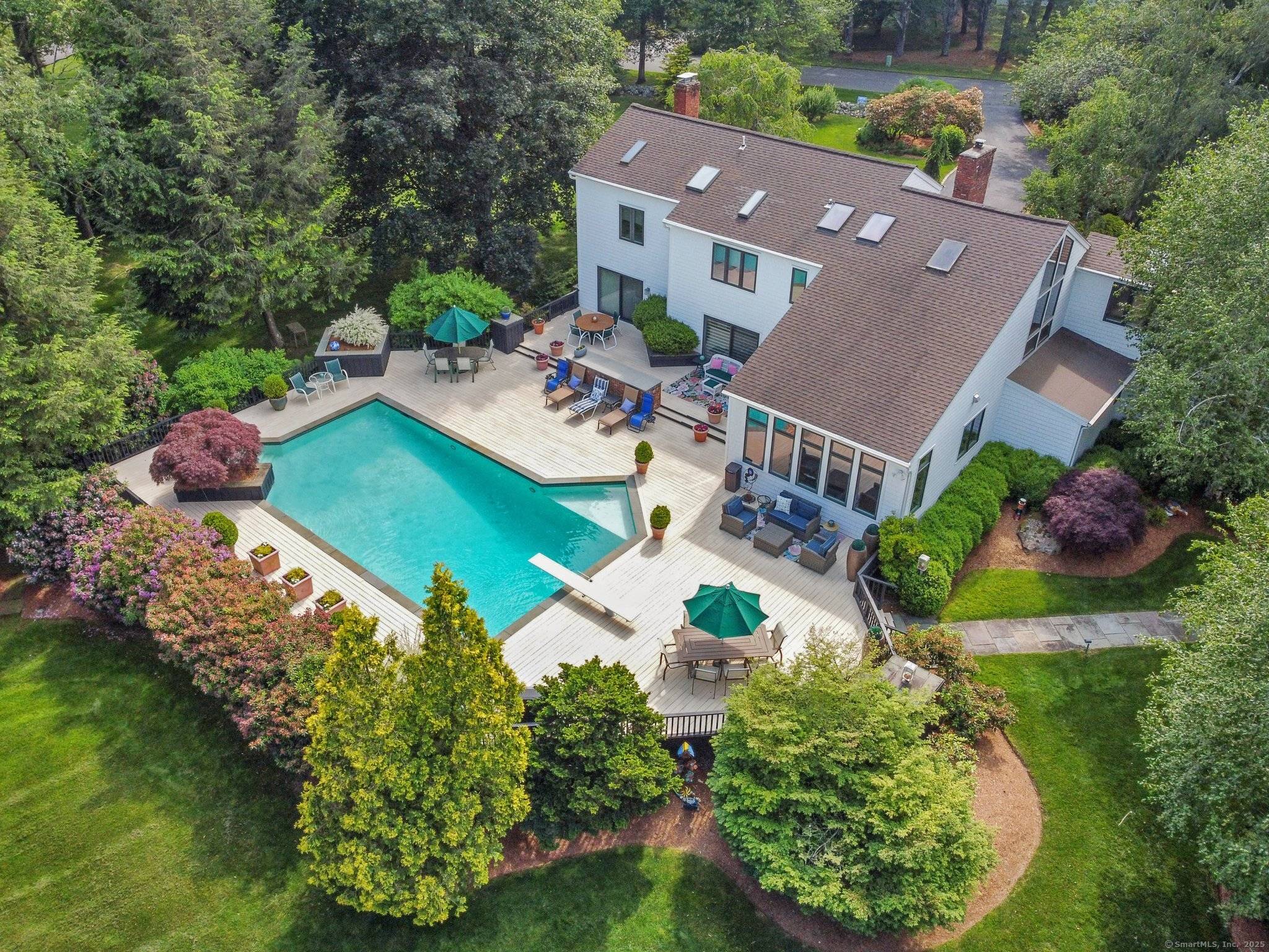 Tucked on a peaceful cul de sac in prime lower Weston, this contemporary gem is a rare find.
