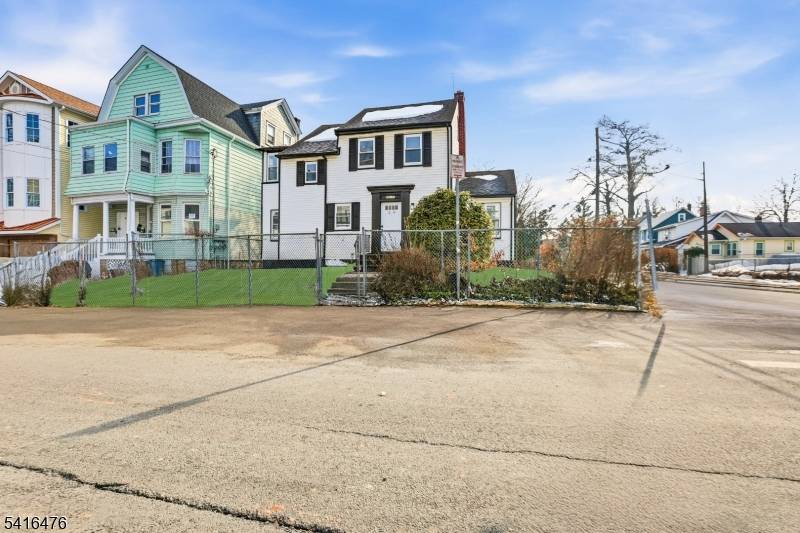 Welcome to 72 Lindsley Ave, a beautifully renovated Colonial situated on a desirable corner lot in Newark, offering classic charm with modern updates.