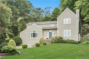 Nestled in the highly sought after Westover neighborhood, this hilltop contemporary colonial is a true gem.