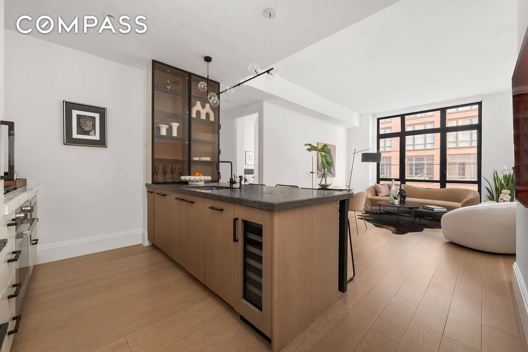 Welcome to residence 2E a charismatic, cosmopolitan home with dramatic casement windows framed in statutory bronze and colossal 10 7 ceilings.