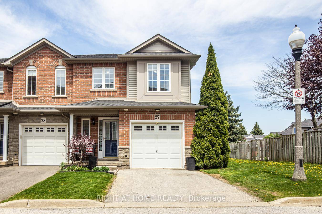 PRICED TO SELL ! ! ! This Large END UNIT Townhome Is a True Gem, Featuring a Beautifully Landscaped Backyard With an Manicured Garden and A Private Garage.