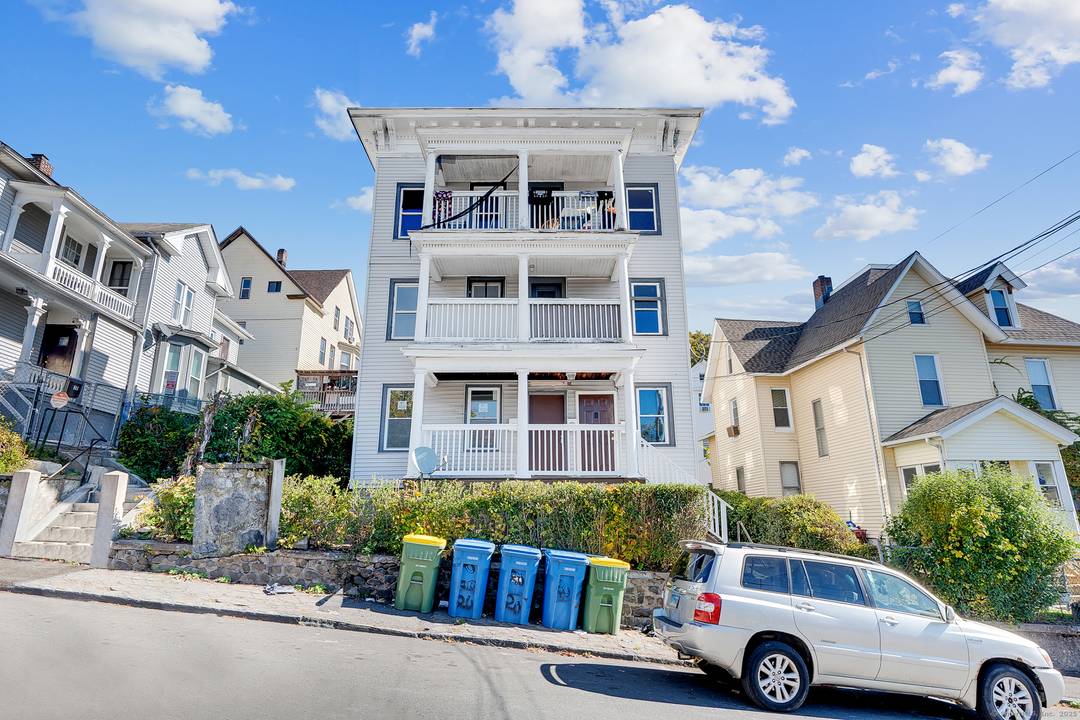 Welcome to 20 Coe Street, a fully updated and turnkey three family property offering both comfort and cash flow.