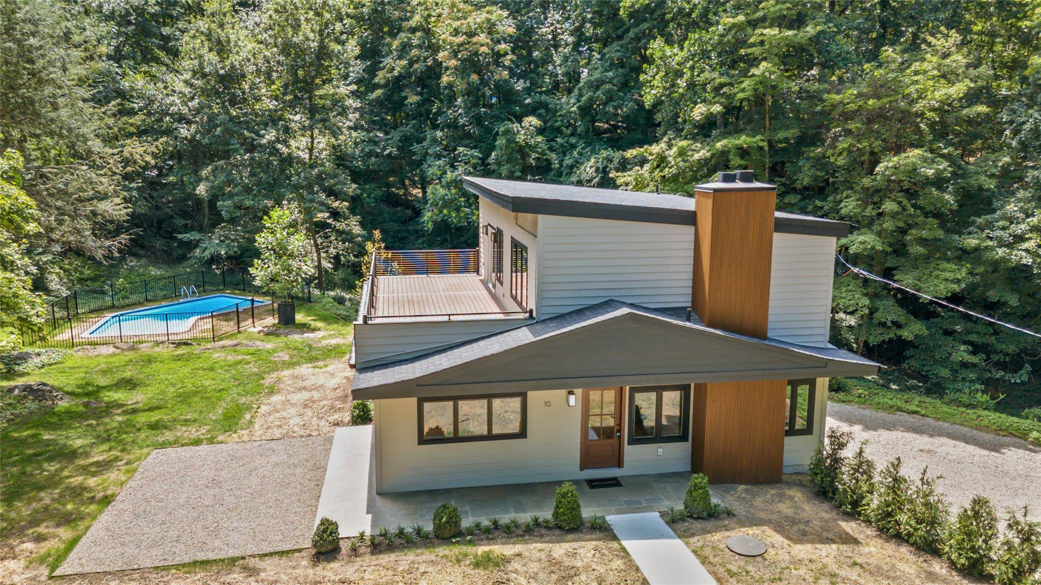 The only thing that stayed the same in this totally renovated Croton on Hudson home is the address.