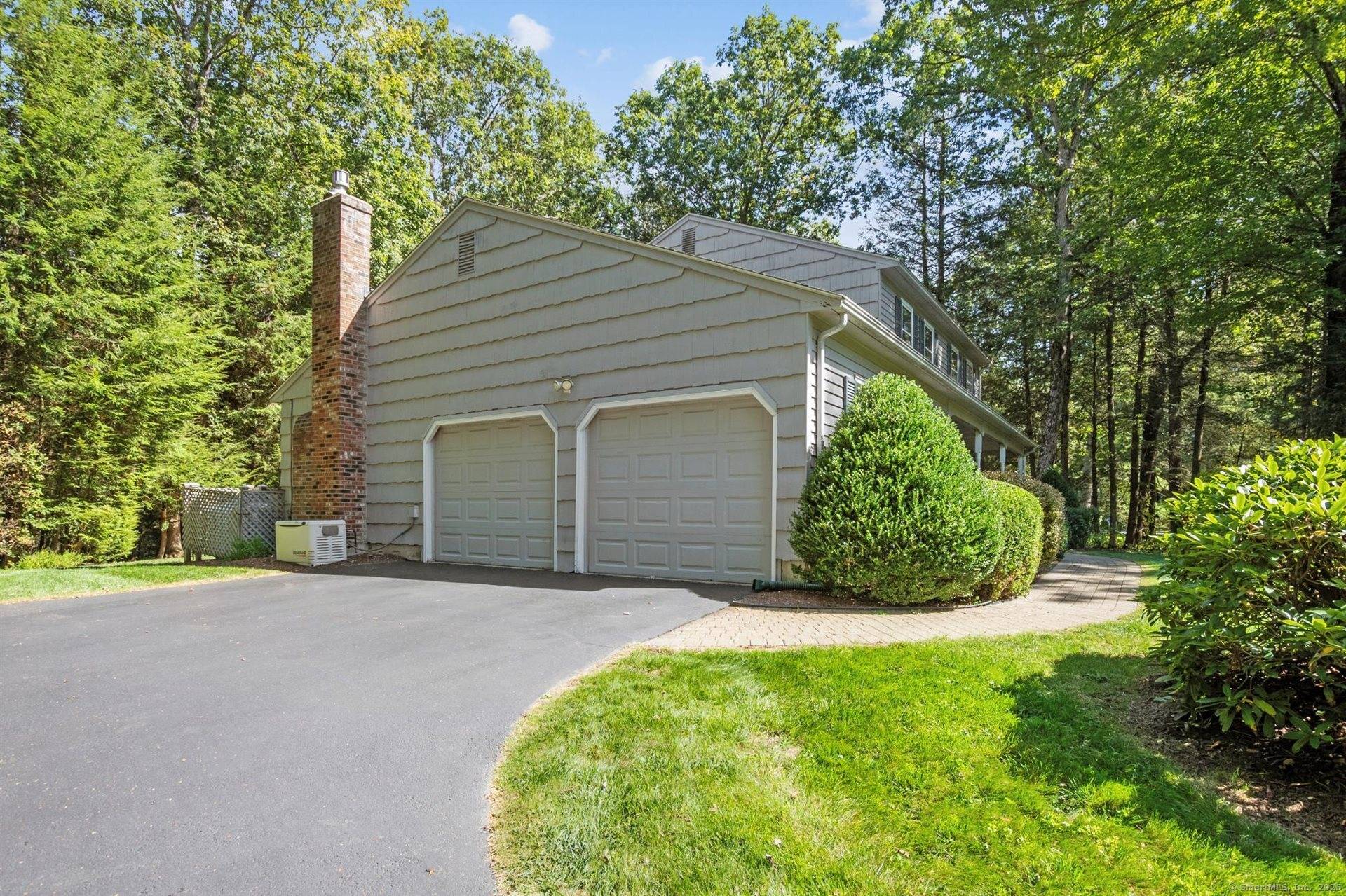 Nestled in one of Simsbury's most popular neighborhoods, this charming 4 bedroom Colonial offers the perfect blend of classic character and modern comfort.