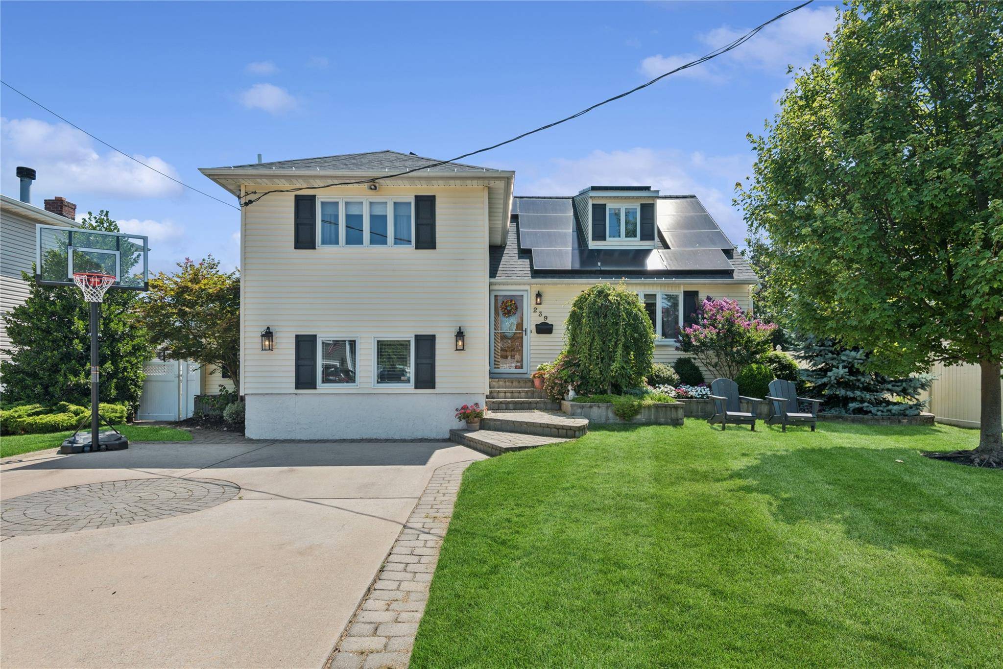 Welcome Home to this Stunning split quietly nestled in the highly sought after village enclave of Massapequa !