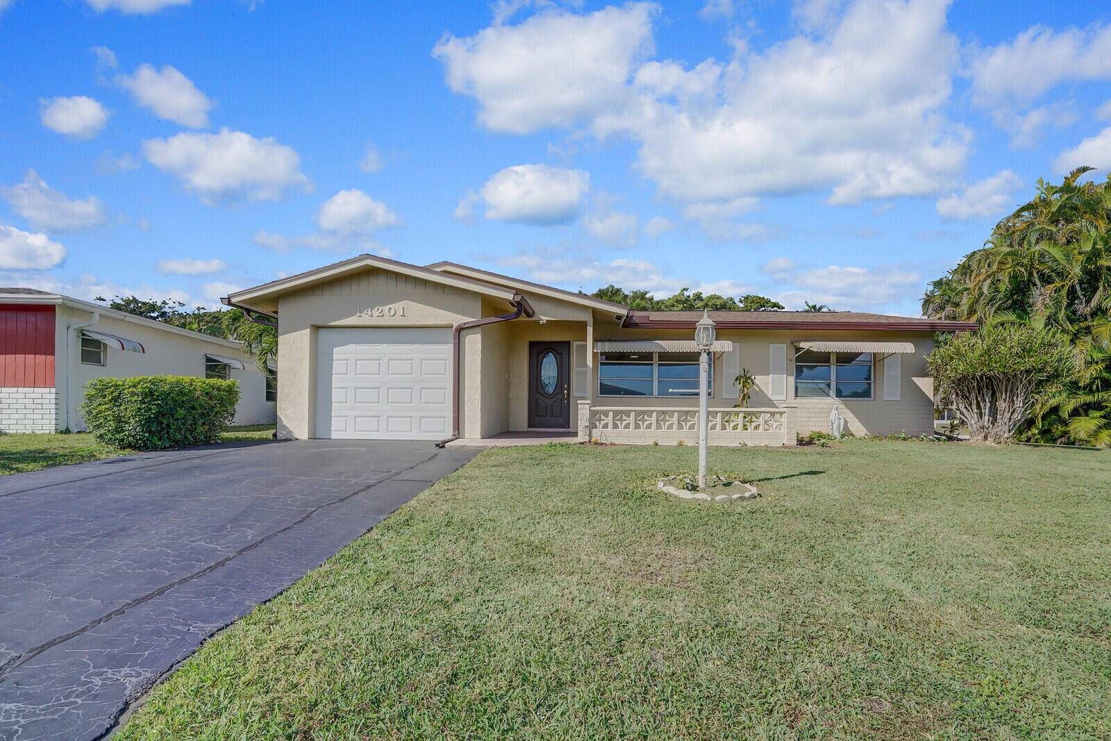 MOVE IN READY ! Beautifully remodeled corner home in a vibrant community !