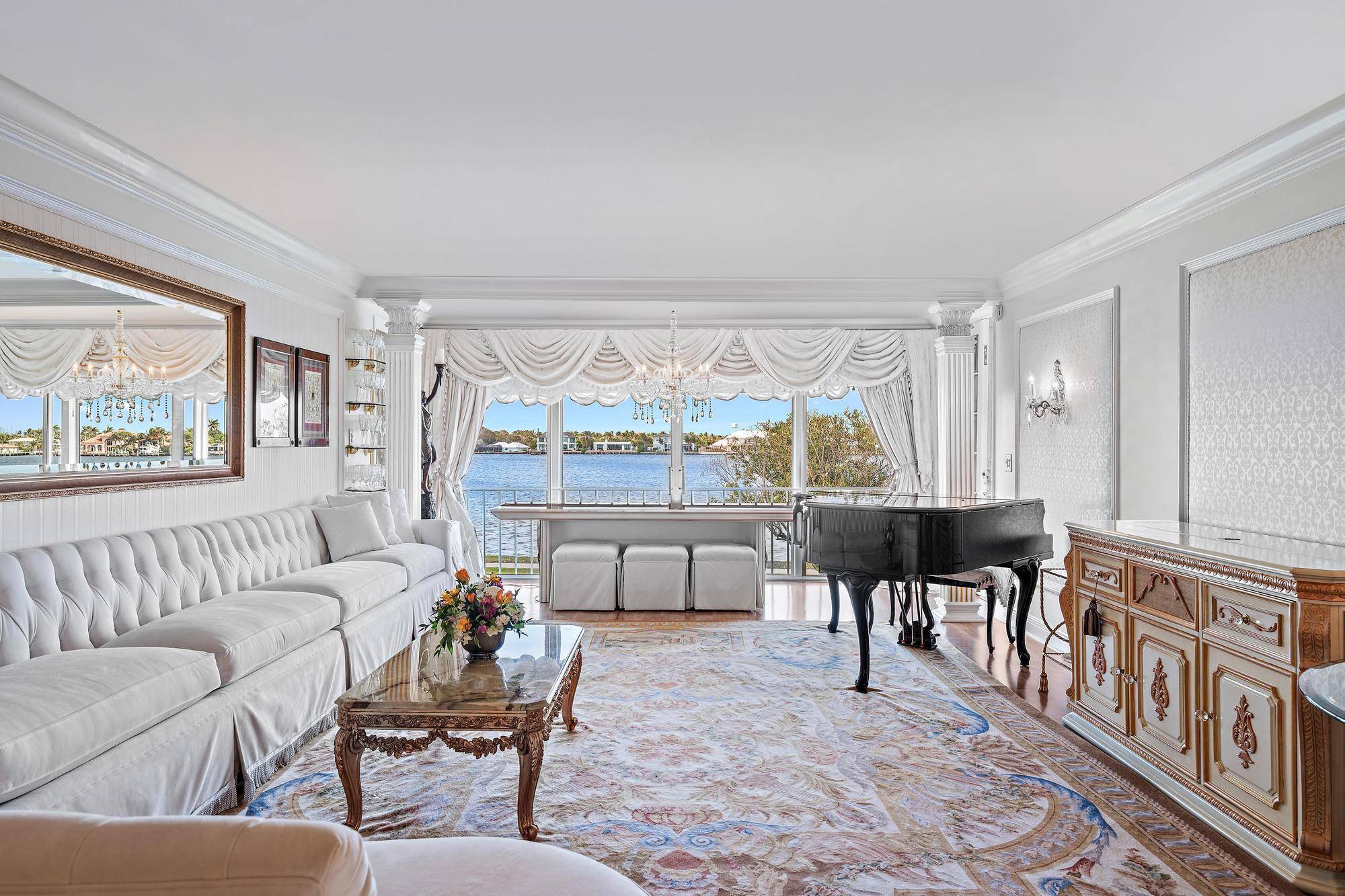 Discover the perfect blend of tranquility and luxury living in this stunning two bedroom, two bath waterfront condo just minutes from the vibrant allure of Palm Beach !