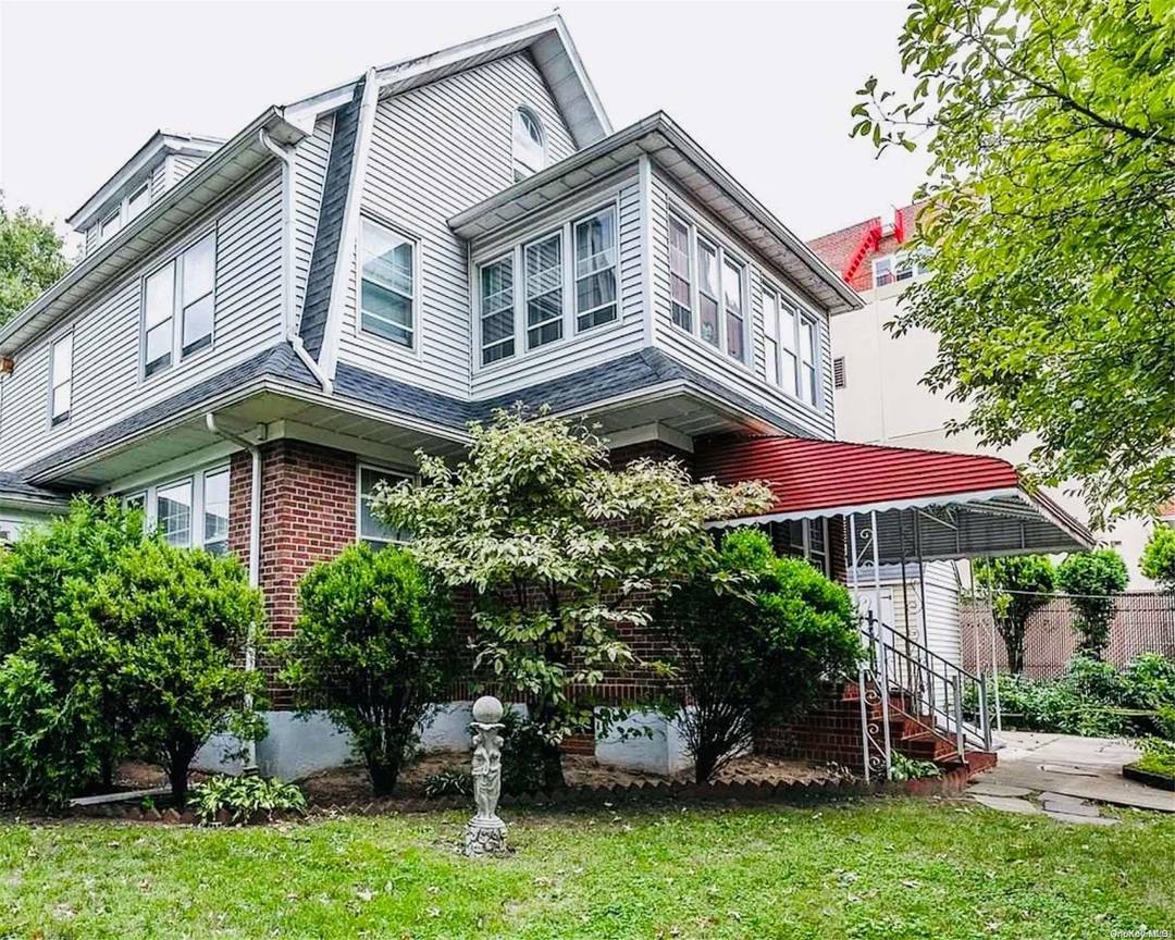 Spotless and Spacious Center Hall Colonial on Oversized Corner Lot !