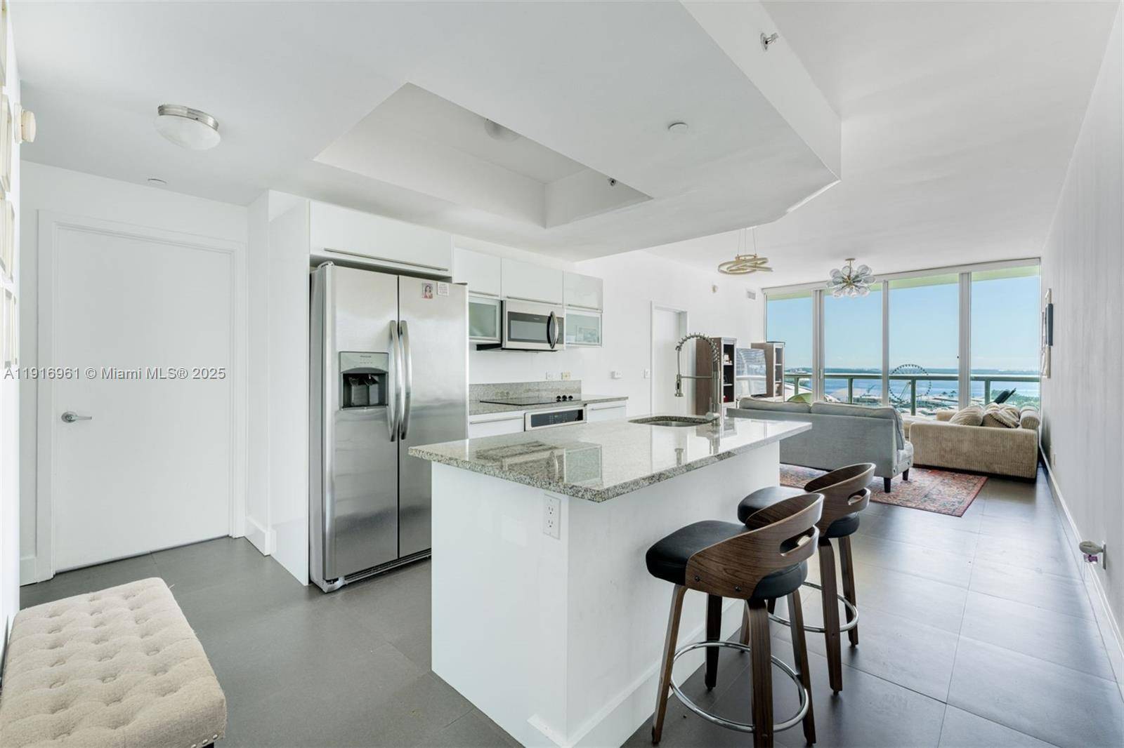 Tastefully updated and move in ready, this bright residence at Marina Blue offers modern finishes, open layouts, and stunning direct Biscayne Bay views.