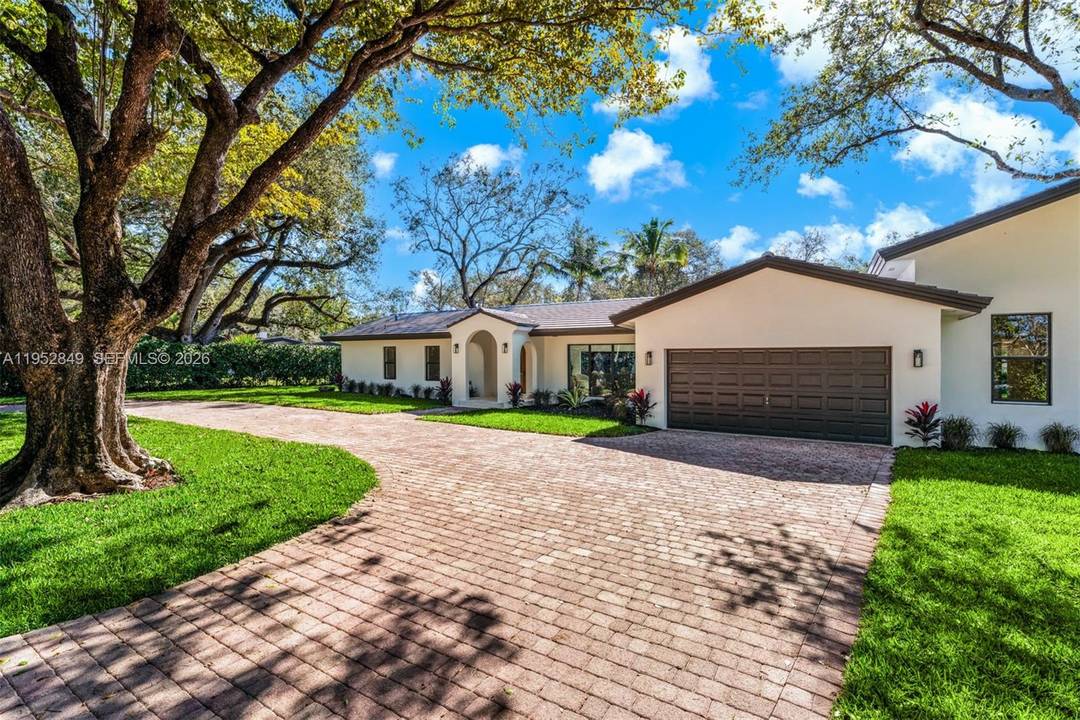 Set on a gated 31, 798 SF lot in the heart of Pinecrest, this thoughtfully remodeled 4BD 3.