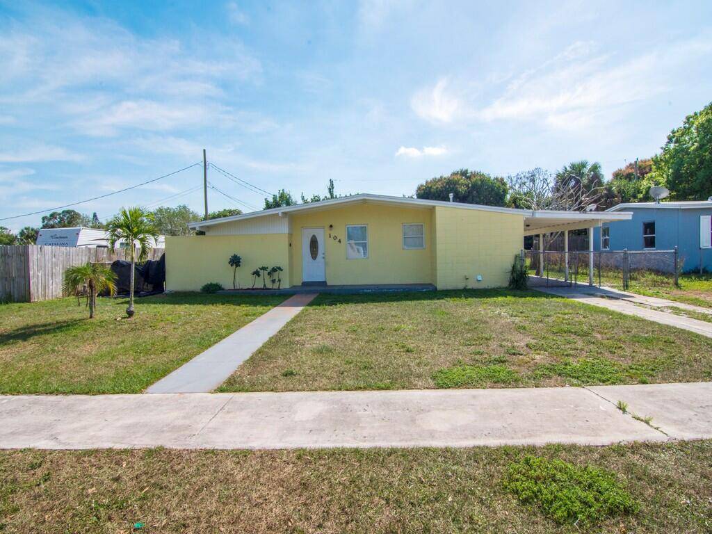 Welcome to this charming CBS home located in the heart of Port St.