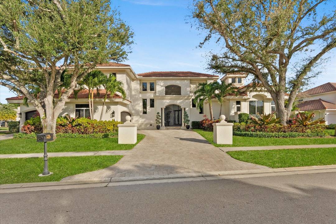 Located in Boca Grove, this two story Mediterranean residence offers 5, 249 living square feet with 5 bedrooms, 5 full baths, 2 powder rooms, plus a home office and private ...