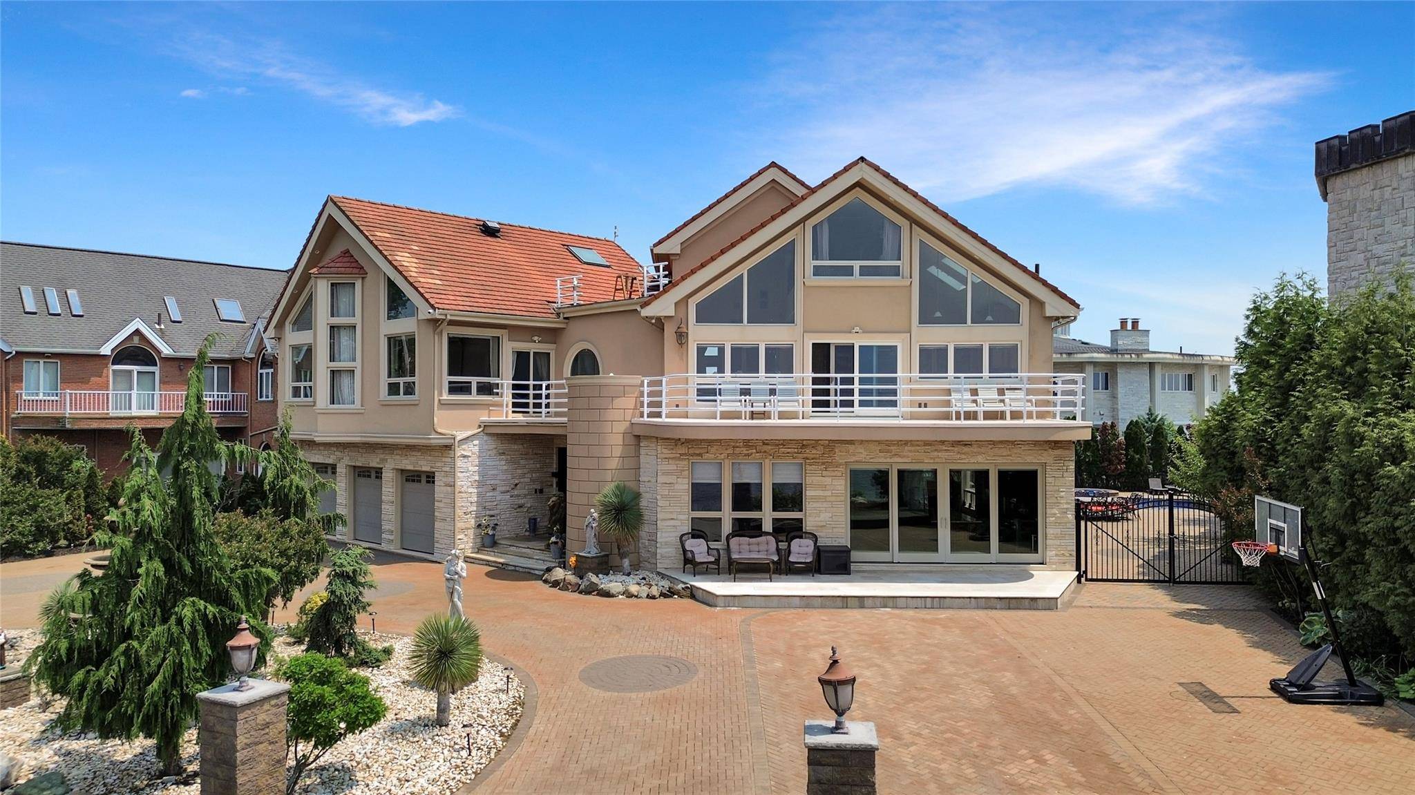 This 7200sq. ft. Spectacular Waterfront home is located at the end of Arbutus Avenue past Nicolosi Drive in the heart of S.