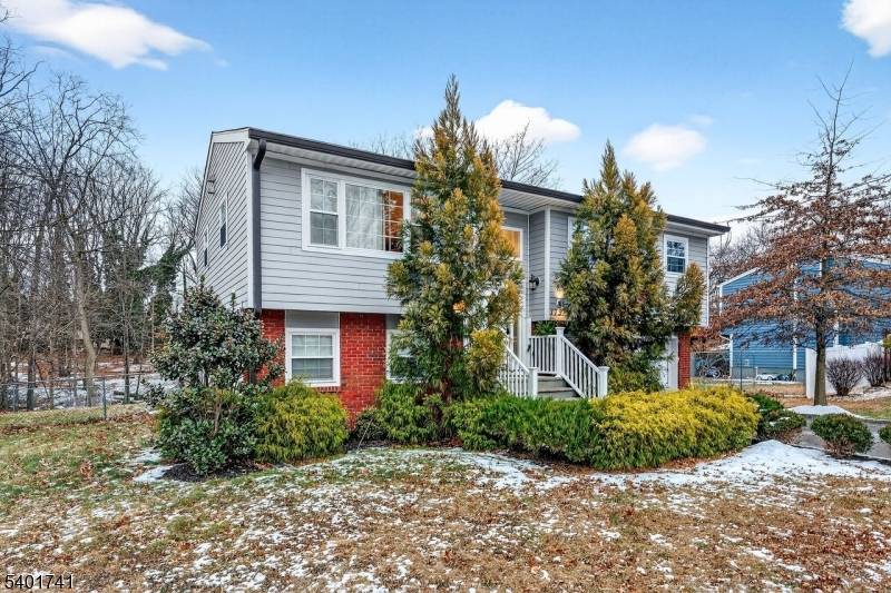 Welcome to this beautifully maintained four bedroom, two bath bi level home offers a perfect blend of comfort, style and privacy.