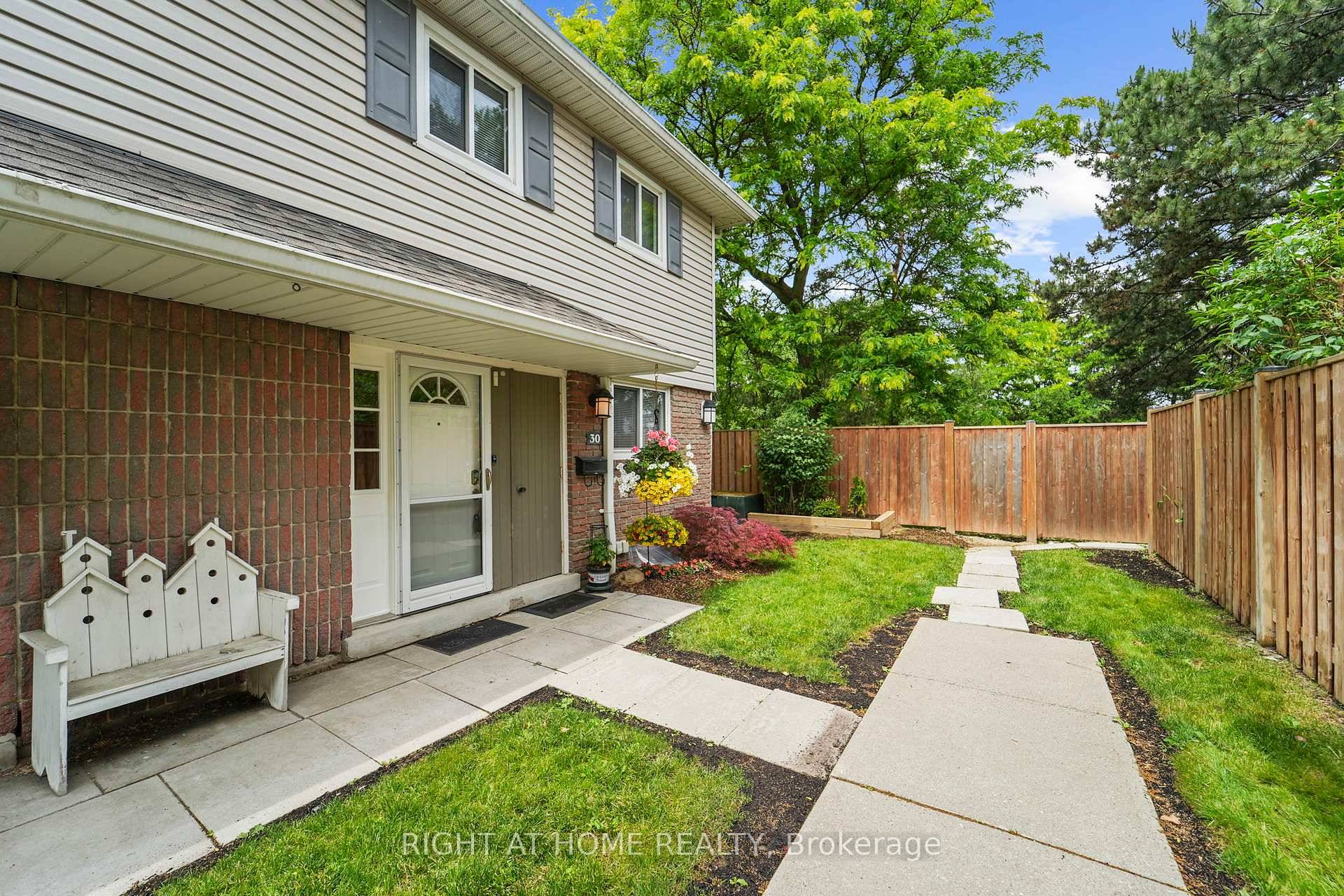 Charming End Unit Townhome in Peel Village Private Backyard Retreat !