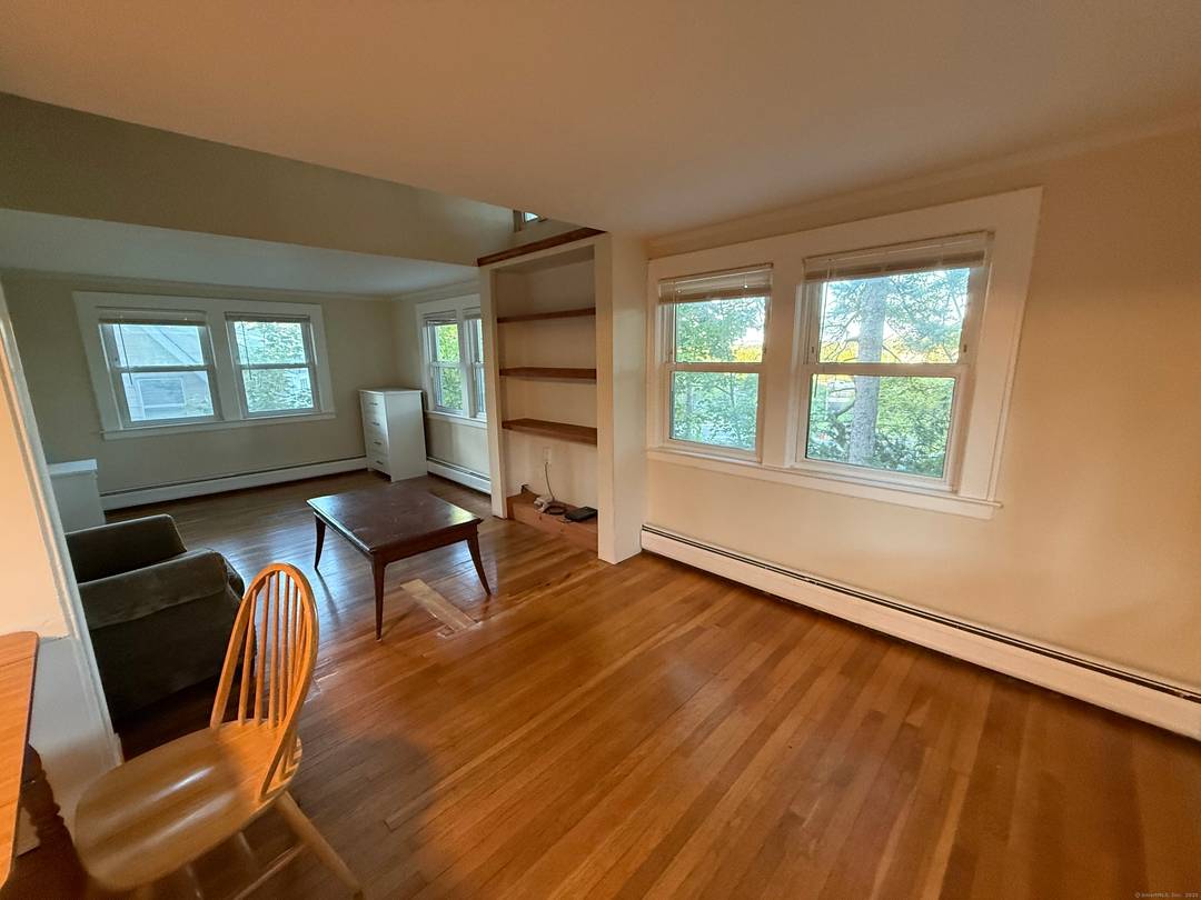 This two family nestled in an extra large wooded lot conveniently near downtown Norwalk is great opportunity for a creative contractor !