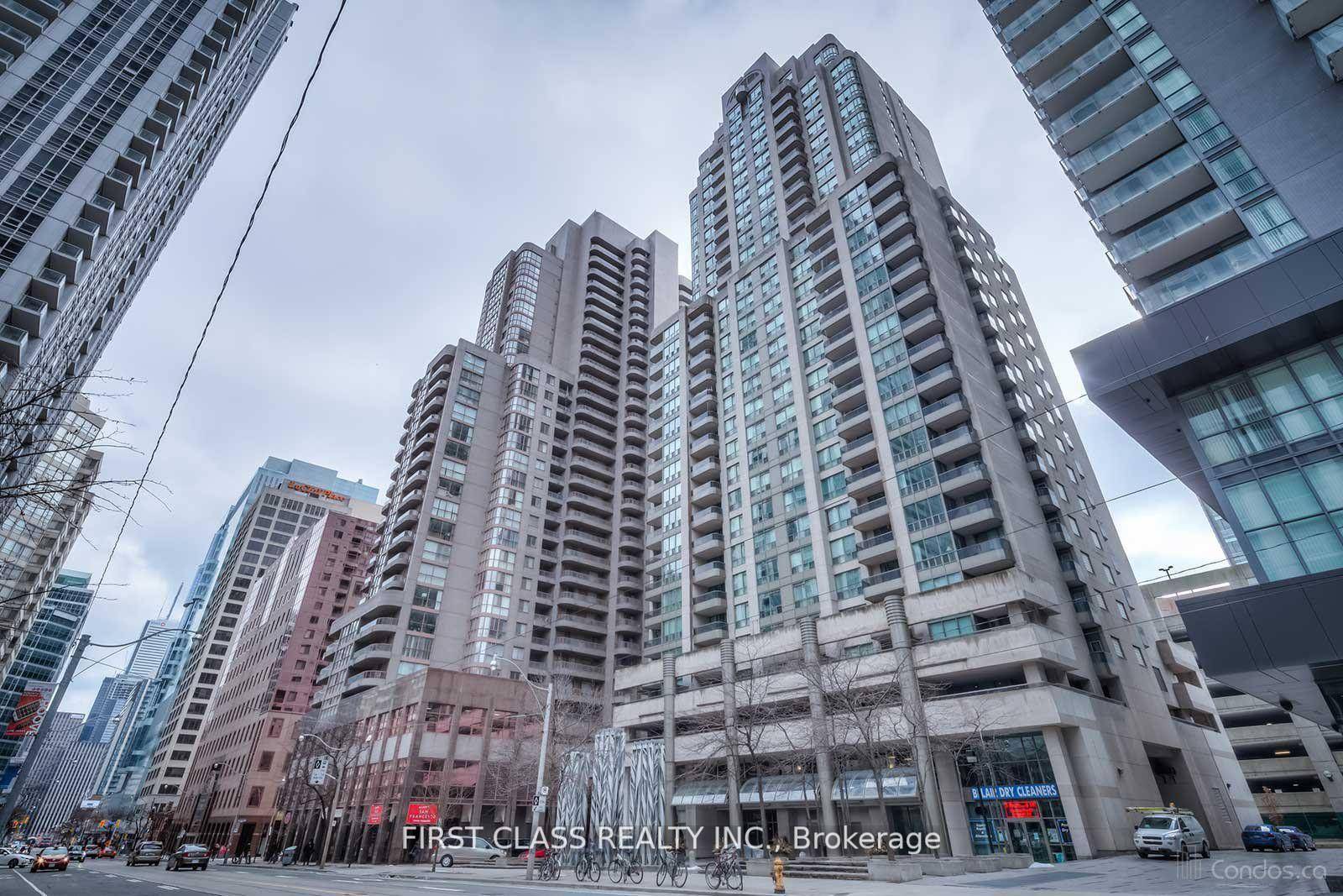 Corner unit in a sought after location, featuring an open concept layout with laminate flooring and a balcony.