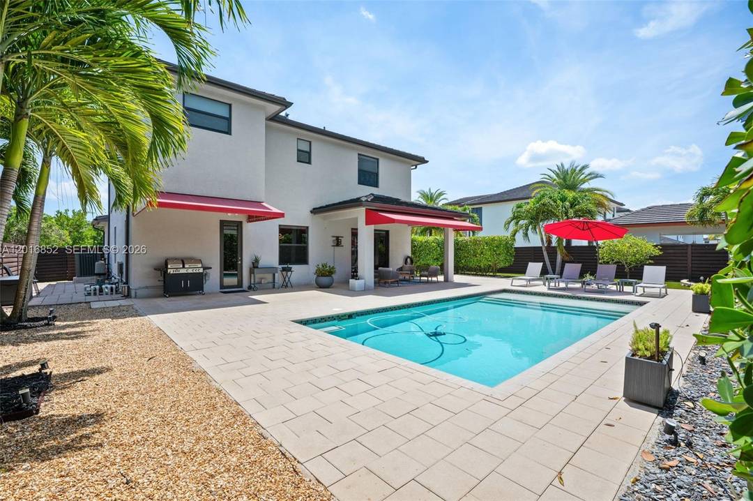 Experience elevated living in the prestigious guard gated community of Satori in Miami Lakes.