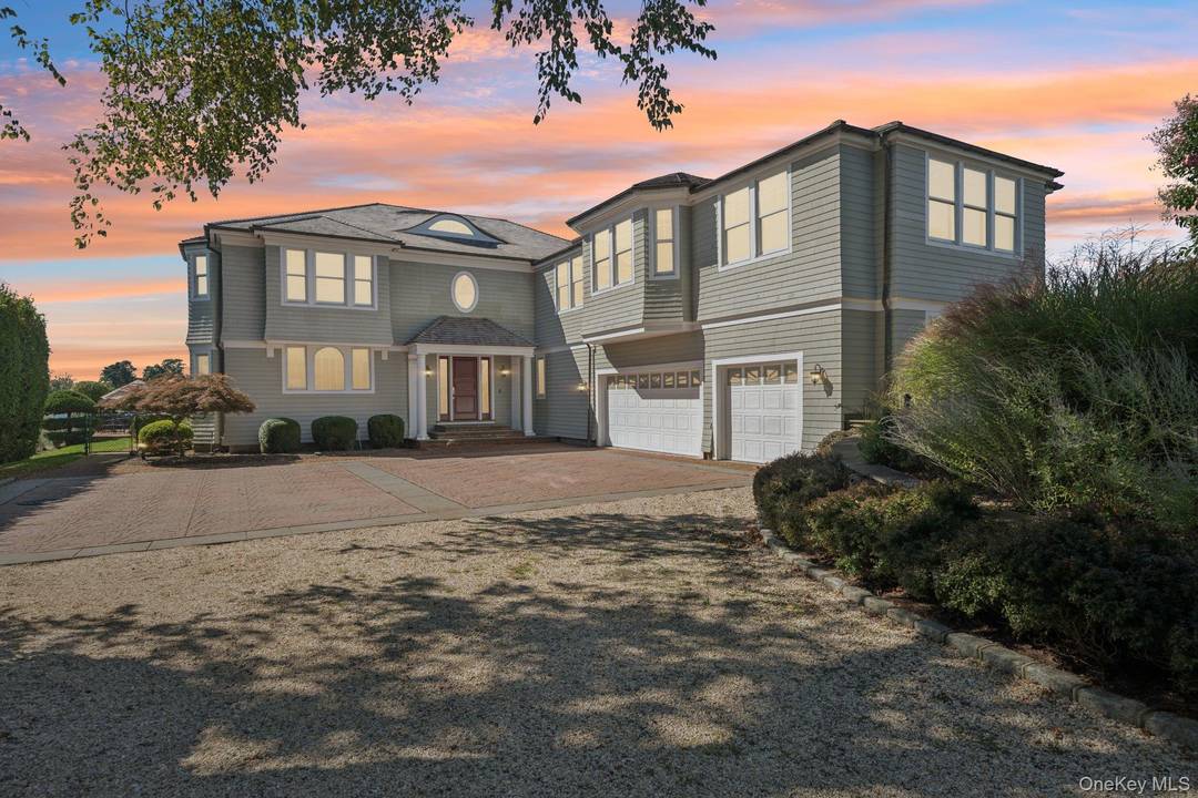 Set along East Quogue s highly sought after Sunset Avenue, this 1.