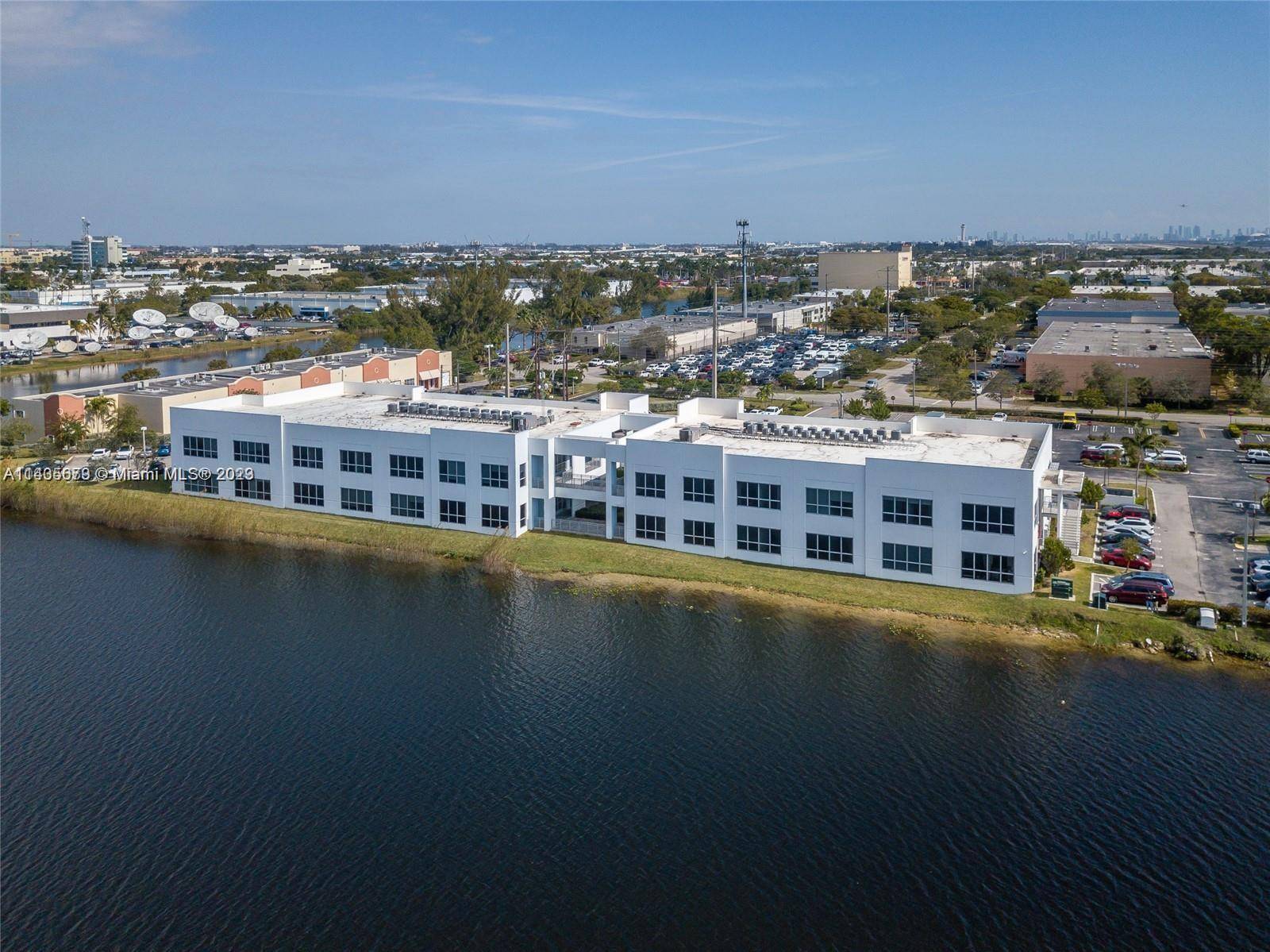 Spectacular modern commercial office OF 1, 030SQFT with water view in desired RIVIERA POINT BUSINESS CENTER AT DORAL.