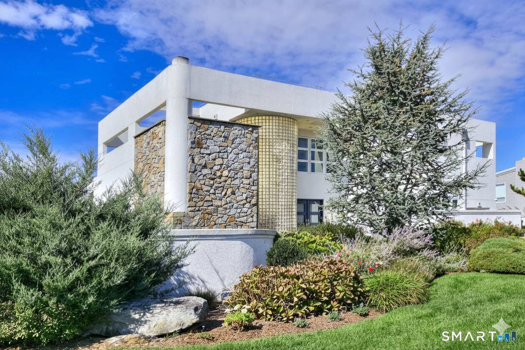 A rare convergence of water, light and privacy, this extraordinary waterfront home offers a lifestyle few ever experience.