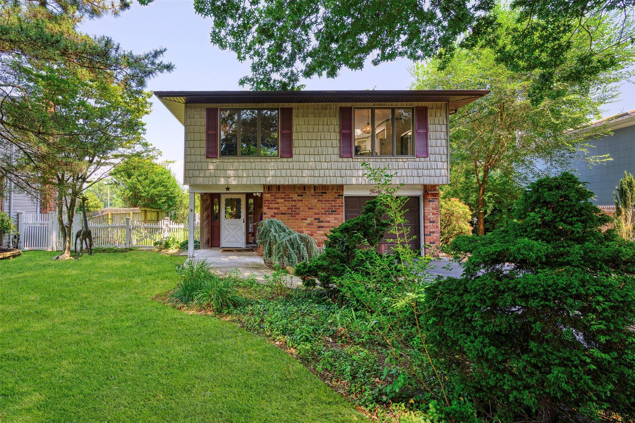Nestled in the prestigious Harbor View East neighborhood, 44 Milland Drive offers a rare blend of comfort, style, and sweeping harbor views.
