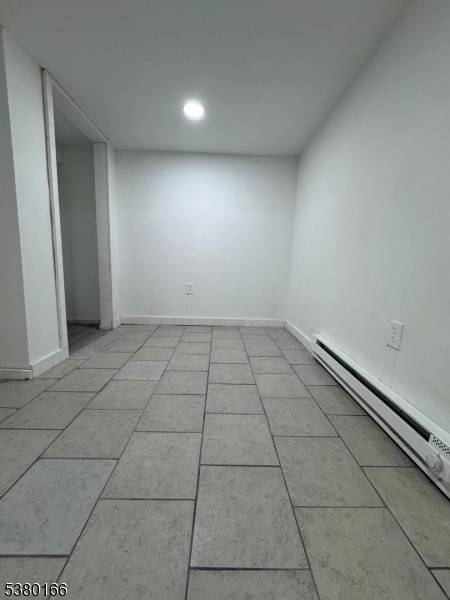 This property offers two legal units plus a fully finished basement, providing excellent rental potential or flexible living options.