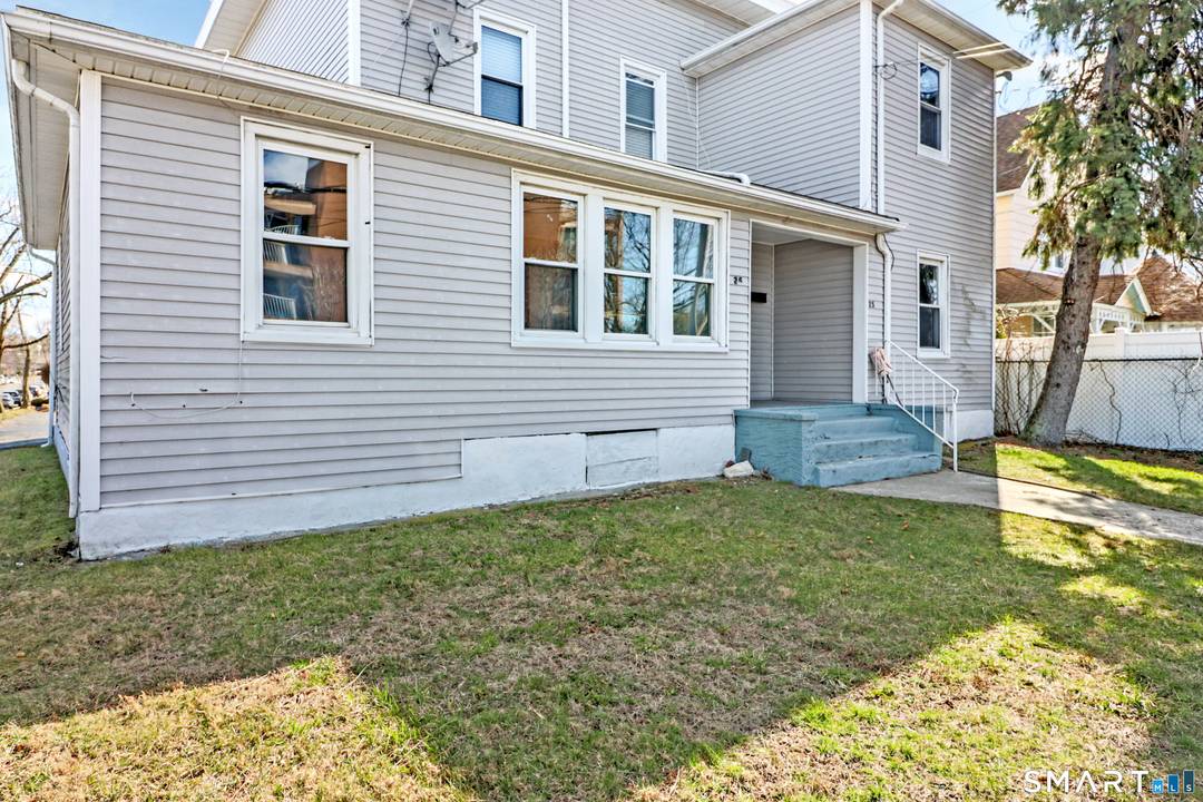 East Norwalk living, across the street from the water with water views from multiple rooms.