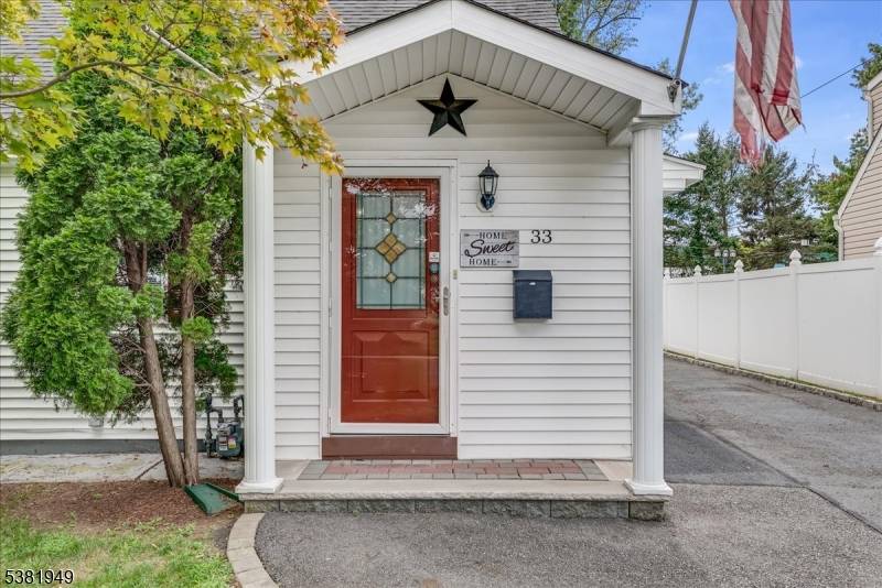 Welcome to this inviting 3 bedroom, 2 bathroom Cape Cod that blends charm with modern comfort.
