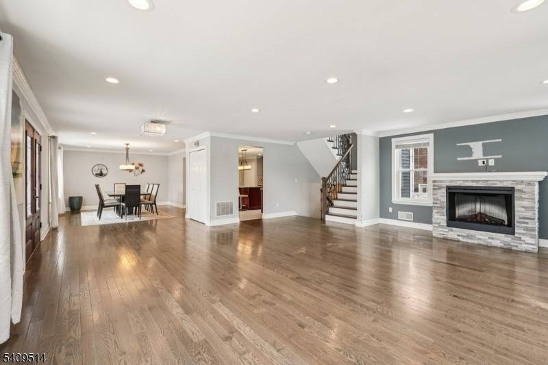 Welcome to this custom Colonial offering over 3, 500 sq ft of living space and situated on a desirable corner lot in the heart of town.