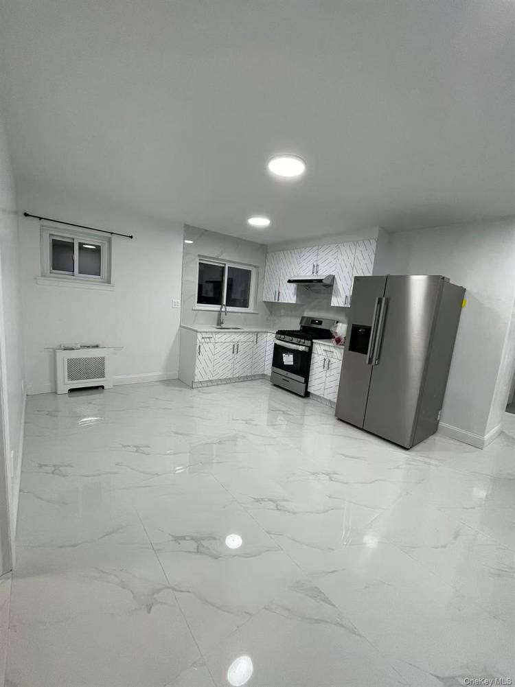 Spacious and well maintained home available for rent in a convenient Fresh Meadows border location !