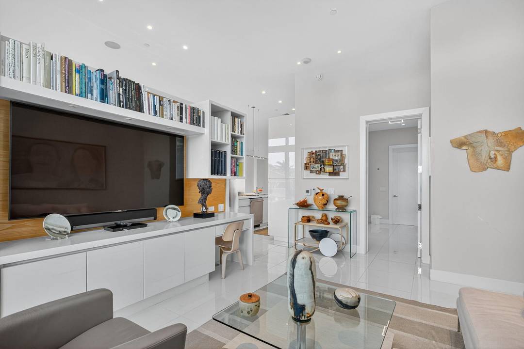 Discover unparalleled luxury in this stunning 2 bedroom condominium, meticulously converted by the original owner from a 3 bedroom layout to create expansive, open living spaces that blend sophistication with ...