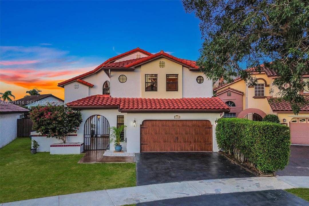 Mediterranean inspired beauty with a rustic courtyard, warm Old World charm, and a versatile 5 bedroom, 3 bath layout in a prime Miami location.