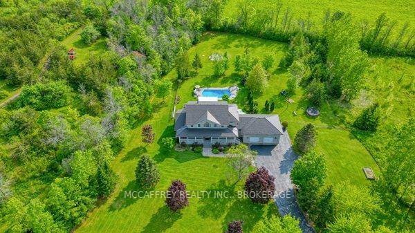 Discover an exquisite stone estate nestled on 18 picturesque acres located just minutes from downtown Napanee.