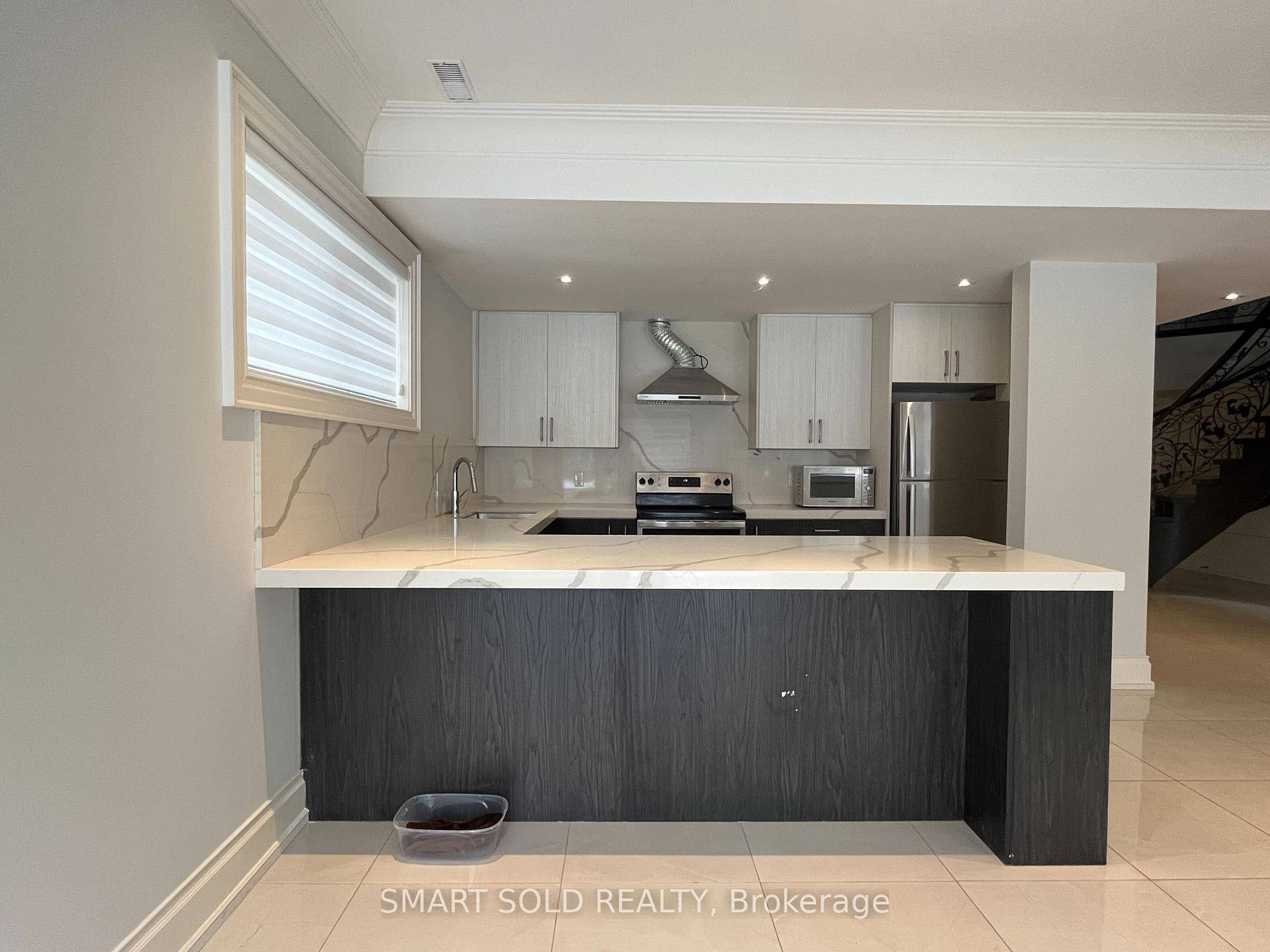 This elegantly appointed basement area features 3 spacious bedrooms, 2 bathrooms, an open concept kitchen, a comfortable living area, its own laundry amp ; a separate entrance for added convenience.