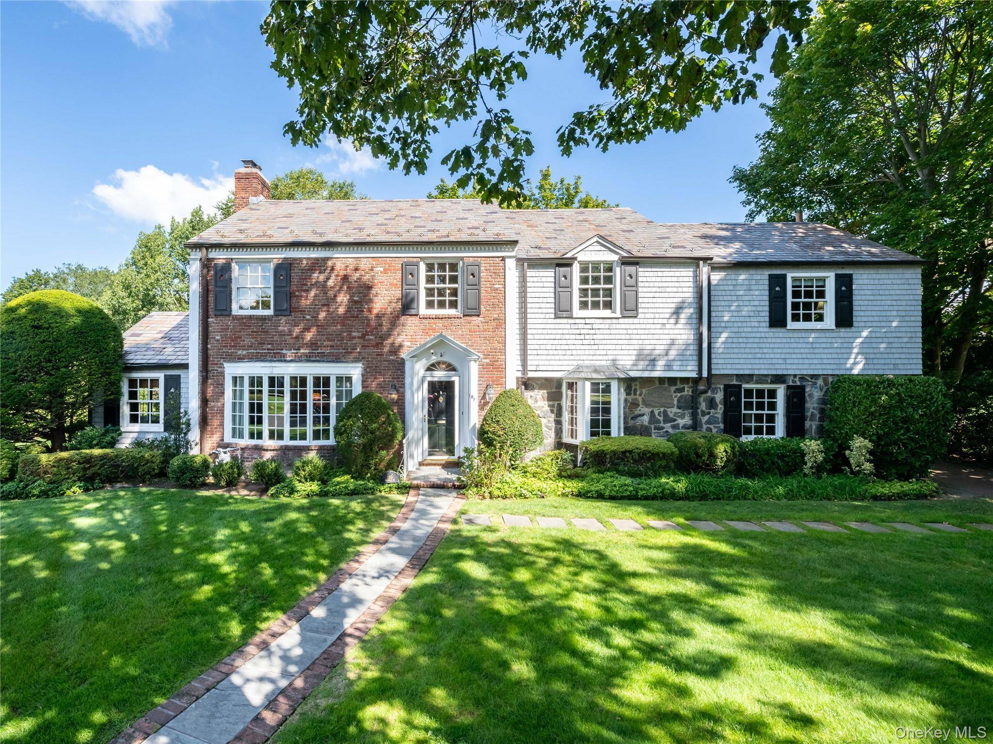 Nestled In The Heart Of Munsey Park, This Stately 6 Bedroom Center Hall Colonial Offers Over 3, 600 Square Feet Of Living Space.