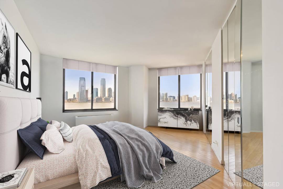 Liberty Terrace Residence 9H amp ; 9J A truly rare and captivating offering at Liberty Terrace two adjacent waterfront residences, 9H and 9J, available exclusively as a combination purchase.