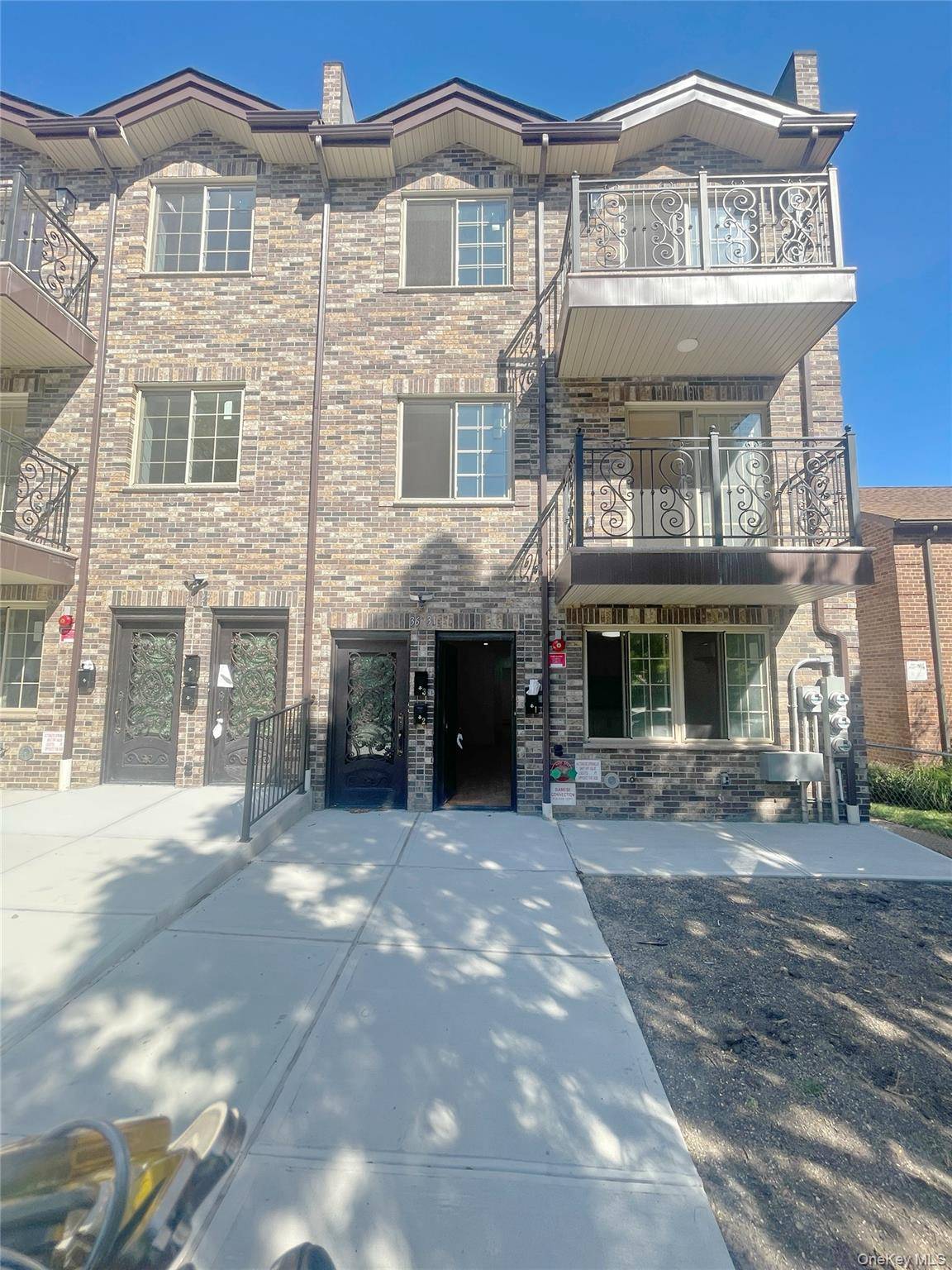 Be the first to live in this Brand New 3 Family Corner Townhouse in a prime location near the subway, LIRR, supermarkets, and schools.